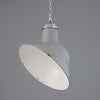 A vintage thorlux grey vitreous enamel ceiling light with an angled shade for directional light