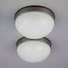 A round flush mount vintage opaline and bakelite ceiling light at 270mm diameter
