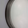 A round flush mount vintage opaline and bakelite wall light at 270mm diameter