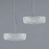 Vintage pendant lights with pressed glass shade with an intricate diamond-cut pattern