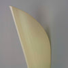 a retro curved glass wall sconce uplighter with a yellowy tint for soft warm illumination