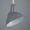 A grey enamel factory parabolic lamp shade which can be mounted from ceiling or wall for directional lighting