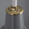 Close up of the brass gallery on a vintage industrial grey enamel light by Benjamin