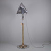 Restored 1940s Maxlume searchlight floor lamp mounted on adjustable machine-gunner’s brass stand