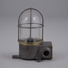 an iron and brass industrial cage wall light restored for modern use