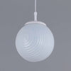 Milk glass pendant light with ribbed glass pattern. Globe shaped vintage light