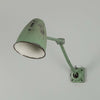 An original 1950s Anglepoise-style green machinist wall light
