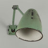 An original 1950s Anglepoise-style green machinist wall light