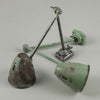 An original 1950s Anglepoise-style green machinist wall light