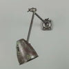 An original 1950s Anglepoise-style green machinist wall light