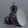a large black enamel factory light hanging from the ceiling. reclaimed and restored for modern use. Manufactured during the 1960s by Elektrosvit