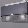 A retro square glass pendant light. 260mm square prismatic glass shades with a black metal housing ceiling mounted on a white rod.
