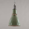 Vintage Thorlux green enamel pendant light on a plain background