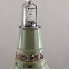 Vintage Thorlux green enamel pendant light on a plain background