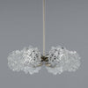 A Vintage Glass Chandelier which features 6 spiky glass globes on a chromed baluster