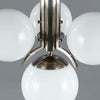 1920s Art Deco Opaline Globe Chandelier featuring 4 milk glass globes on a pewter ballust mounted to the ceiling