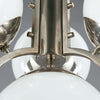 1920s Art Deco Opaline Globe Chandelier featuring 4 milk glass globes on a pewter ballust mounted to the ceiling