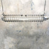 A 1970s vintage industrial caged strip light with cage at 4.5ft long restored with LED T8 tubes.