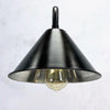 The wall mounted industrial style black downlight is a new fixture based on the design of the British Army festoon shades that were used in the field. Made in England by Loomlight, the conical steel lamp shade is painted satin black and is extended from the wall by a curved black wall arm fixture. Ideal for illuminating pictures on the wall or down lighting walls for ambiance. This wall fixture can be used on its own or alongside ceiling lights.