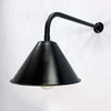 The wall mounted industrial style black downlight is a new fixture based on the design of the British Army festoon shades that were used in the field. Made in England by Loomlight, the conical steel lamp shade is painted satin black and is extended from the wall by a curved black wall arm fixture. Ideal for illuminating pictures on the wall or down lighting walls for ambiance. This wall fixture can be used on its own or alongside ceiling lights.