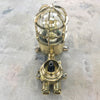 Vintage industrial brass Wiska Wall light featuring a cage and wiska isolator switch. Suitable for indoor or outdoor lighting.