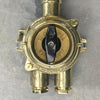 Wiska Isolator Switch as part of the vintage industrial brass wall light with cage.