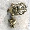 An original Wiska industrial brass wall light with a protective cage and junction box. A professionally restored and rewired fixture rated IP56 so ok to use outdoors.