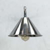 an industrial style aluminium wall light. It has a conical shaped aluminium lamp shade which is attached to a curved galvanised steel wall arm making this a wall mounted down light ideal for illuminating pictures on the wall or adding ambience alongside ceiling lights.