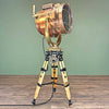 Daylight signal light by Shonan Kosakusho, reclaimed from military war ships. Paired with a military gyroscope to create a bespoke large tripod floor lamp
