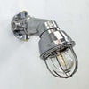 Flameproof aluminium wall sconce suitable for outdoor use. Tilting wall light also great for modern interiors made by DTS and Italian company