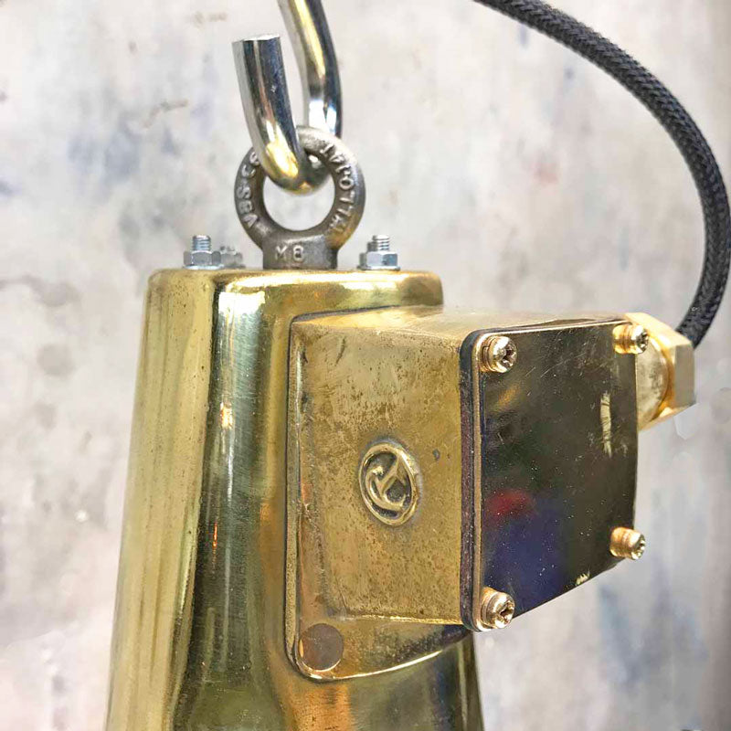 A large brass marine searchlight ceiling light. Originally a brass marine searchlight converted into a ceiling light by Loomlight