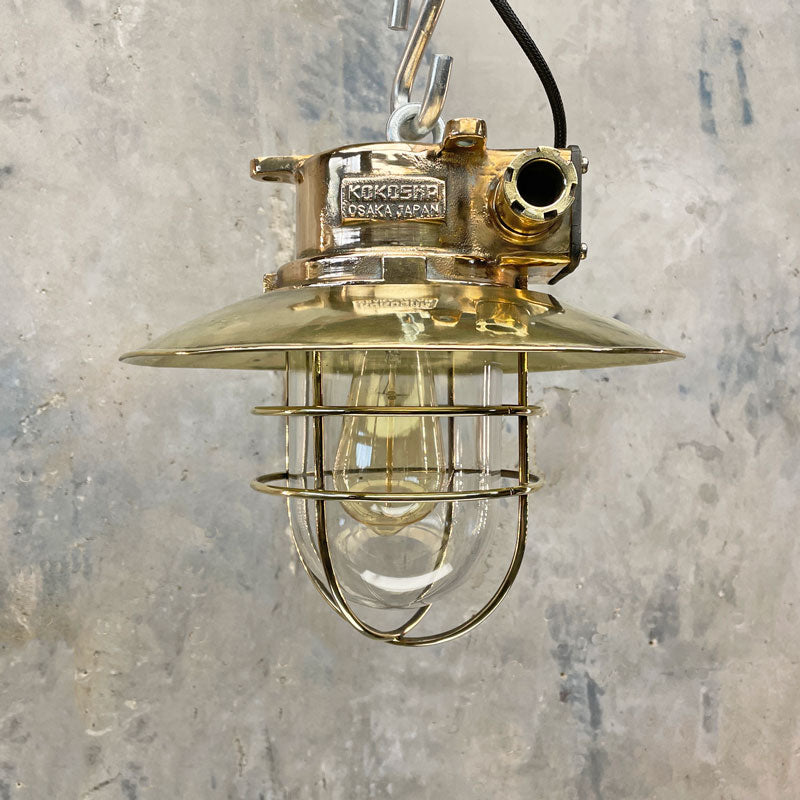 Vintage industrial brass and bronze cage ceiling light by Japanese manufacturer Kokosha. An original industrial ceiling light with an explosion proof design. Compatible with LED light bulbs. 