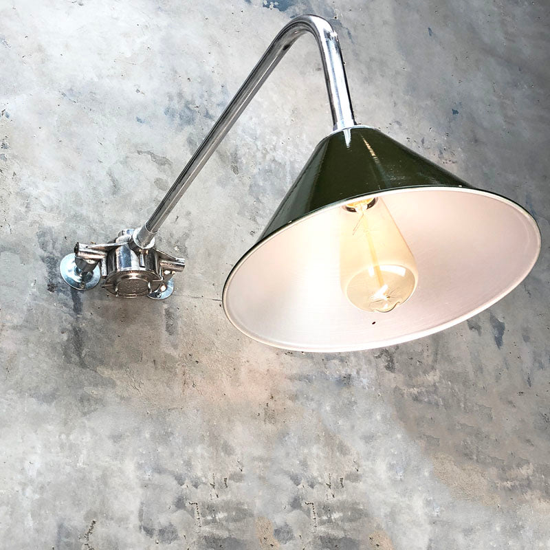 industrial style downlight for the wall. This is a green enamel festoon shade with a steel 90 degree wall arm fixture