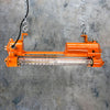 Orange vintage strip light reclaimed and restored for modern interiors. Retro Edison Tube Strip Light refurbished by British lighting restoration specialists Loomlight.