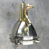 Large Stainless Steel Pendant Light with a brass top section. It has been reclaimed from decommissioned cargo ships. Loomlight professionally restore these fixtures and rewire with E27 lamp holders compatible with LED light bulbs.