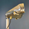 Bespoke steampunk floor lamp reclaimed and restored with an aluminium lamp head fitted to an extendable tripod by Linhof
