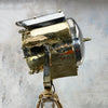 A tall nautical brass and steel searchlight mounted onto a British antique wooden surveyors tripod. A unique and original tall tripod floor lamp perfect for creating the "wow" factor with a nautical style fixture.
