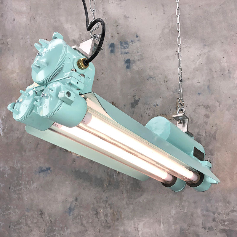 Our original industrial flameproof striplight is professionally refurbished. Fitted with LED T8 tubes and refinished with marine green paint, these retro light fixtures have been transformed into an industrial feature ceiling light perfect for modern interiors. 