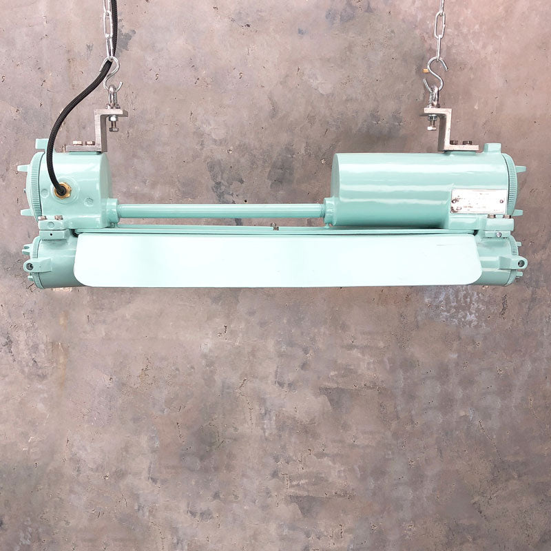 Our original industrial flameproof striplight is professionally refurbished. Fitted with LED T8 tubes and refinished with marine green paint, these retro light fixtures have been transformed into an industrial feature ceiling light perfect for modern interiors.
