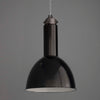 black enamel vintage industrial ceiling light on a grey background