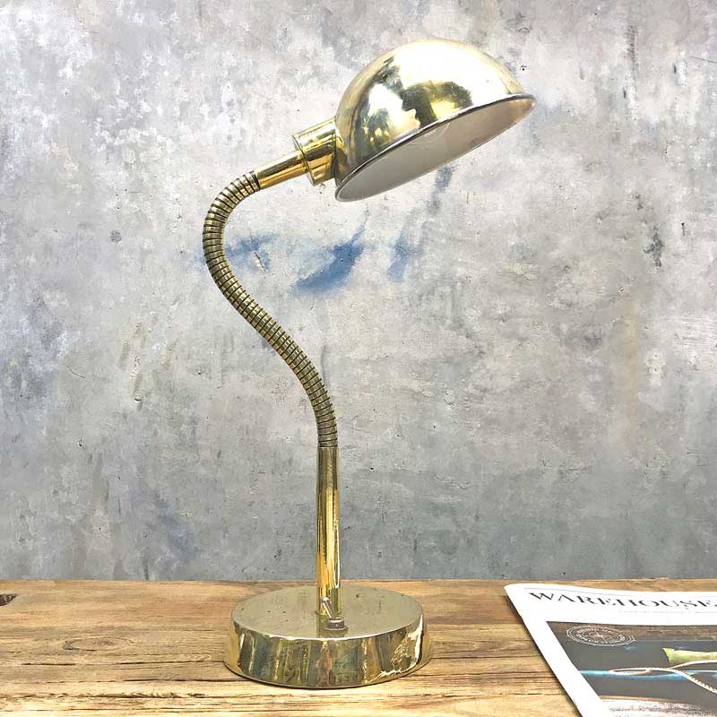 Shop the swan neck table lamp from our collection of vintage industrial lighting. A reclaimed vintage brass desk lamp professionally rewired for modern interiors. This brass swan lamp is an ideal bedside lamp 