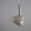 Large grey vitreous enamel factory pendant lights with angled shade for directional task lighting.