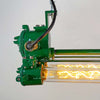 a vintage industrial tube light reclaimed from old ships and fully restored by the team at Loomlight in UK. It is a twin tube light fitted with Edison filament LED tubes that are dimmable. The aluminium body is painted a deep green. This is a unique showstopper of a ceiling light.