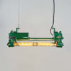 a vintage industrial tube light reclaimed from old ships and fully restored by the team at Loomlight in UK. It is a twin tube light fitted with Edison filament LED tubes that are dimmable. The aluminium body is painted a deep green. This is a unique showstopper of a ceiling light.