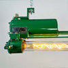 a vintage industrial tube light reclaimed from old ships and fully restored by the team at Loomlight in UK. It is a twin tube light fitted with Edison filament LED tubes that are dimmable. The aluminium body is painted a deep green. This is a unique showstopper of a ceiling light.
