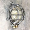 Shop our outdoor wall sconce made in aluminium with a robust metal cage. Vintage industrial lighting reclaimed and restored to modern standards.