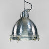 This aluminium dome industrial pendant light is a restored original industrial lamp from the late 1970s, manufactured for use on old ships and engineered to withstand harsh marine conditions. Refurbished by hand in the UK by Loomlight, while retaining its rugged, industrial character, it’s ready to shine again in modern interiors 