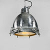 This aluminium dome industrial pendant light is a restored original industrial lamp from the late 1970s, manufactured for use on old ships and engineered to withstand harsh marine conditions. Refurbished by hand in the UK by Loomlight, while retaining its rugged, industrial character, it’s ready to shine again in modern interiors 