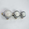Shop unusual wall lights at Loomlight, restored vintage industrial lighting. This quirky trio of industrial spotlights has frosted glass and compatible with LED bulbs.