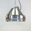 industrial ceiling light in aluminium with a cage covering the glass lens. Reclaimed and restored for modern interiors, This was originally manufactured by VEB Leuchtenbau Wittenberg and restored by Loomlight Design in UK